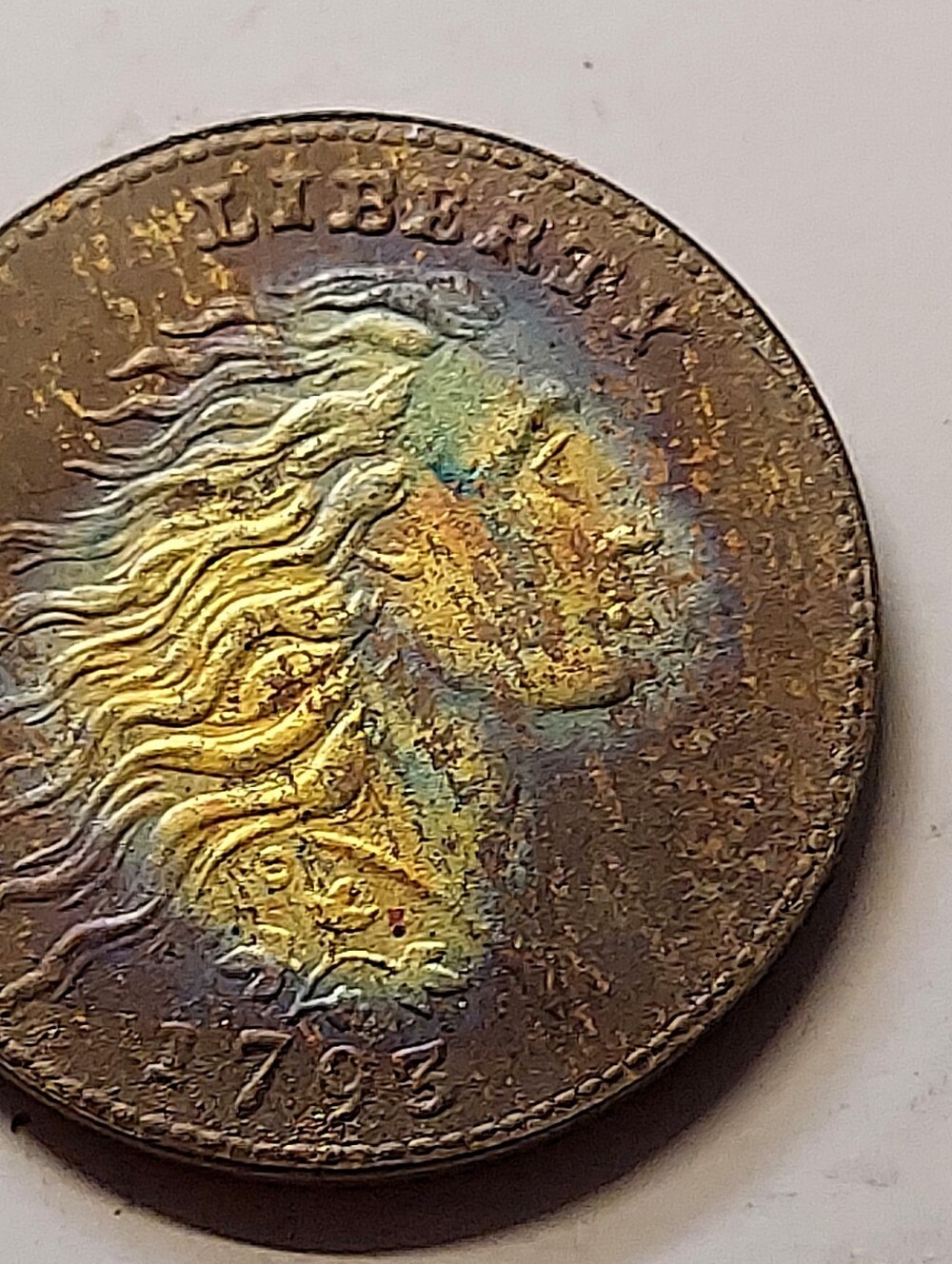 Vintage Toned Coin with Rainbow Patina